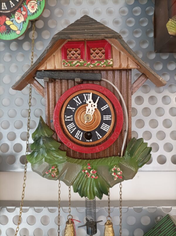 Orologio a cucù vintage con donnina su altalena - immagine 2